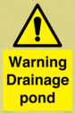 warning-drainage-pond~